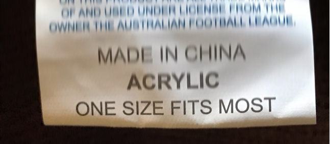 Photo of a clothing label that reads "one size fits most"